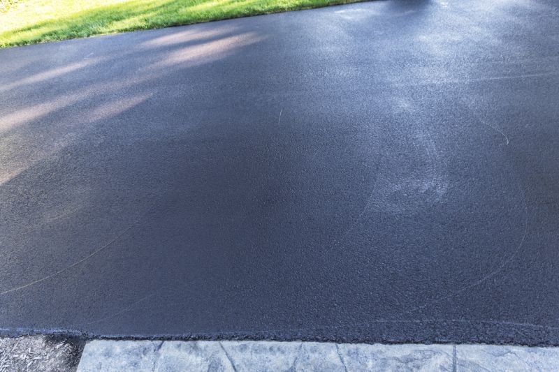 Refinished Driveway with Fresh Coating